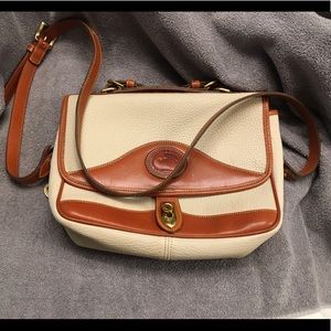 *Reposhing* Authentic Dooney and Bourke